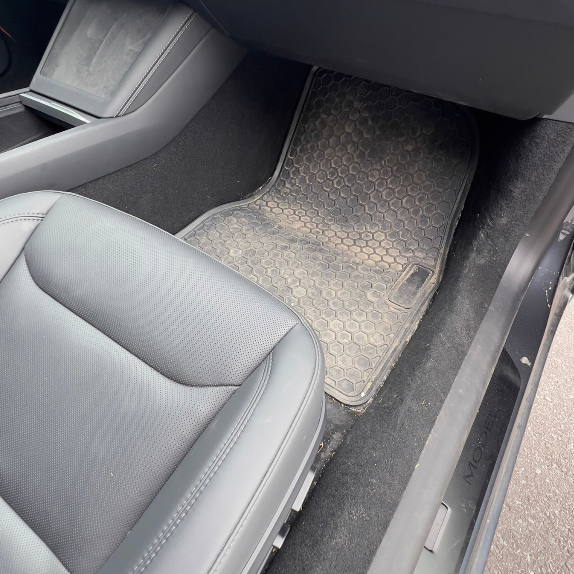 dirty interior floor mat before steam cleaning – car detailing Ottawa
