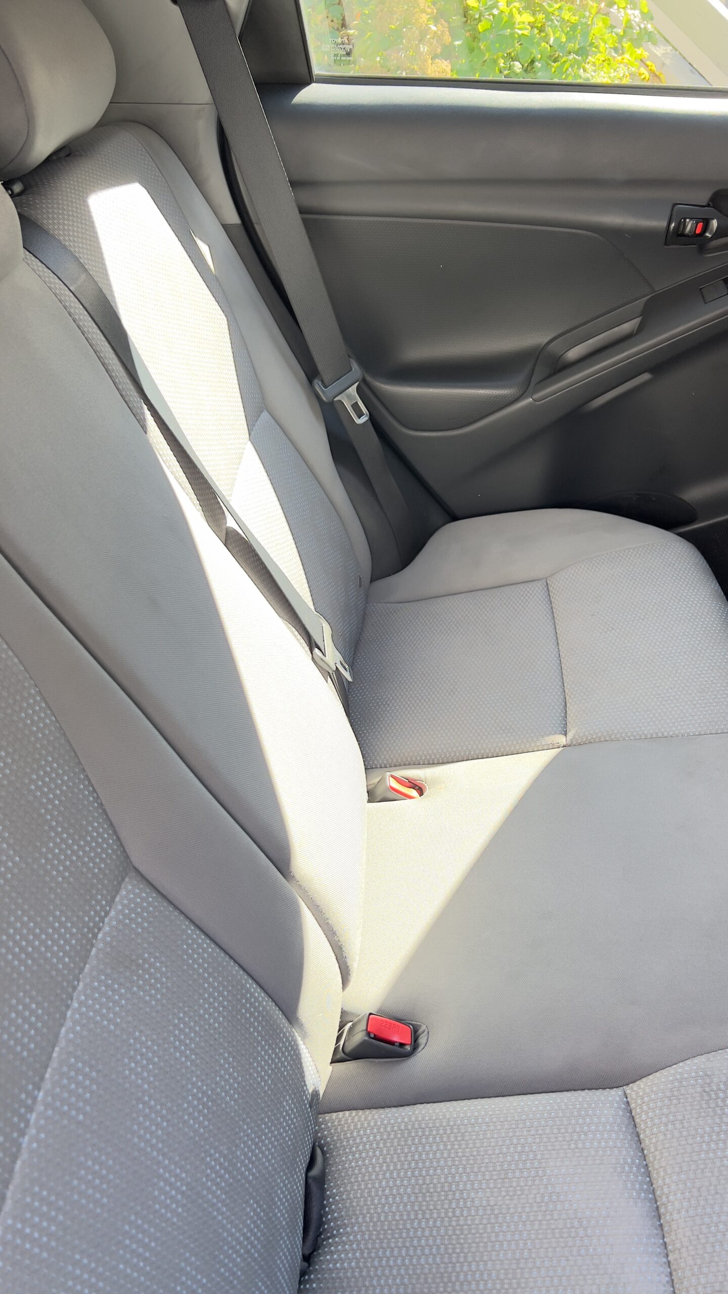 back seat after steam cleaning with clean floor mat – car detailing Ottawa